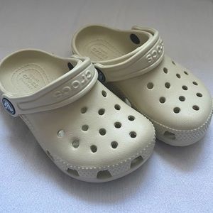 CROCS toddler size 8C. Bone/cream color. NEVER WORN, excellent cond. No box.